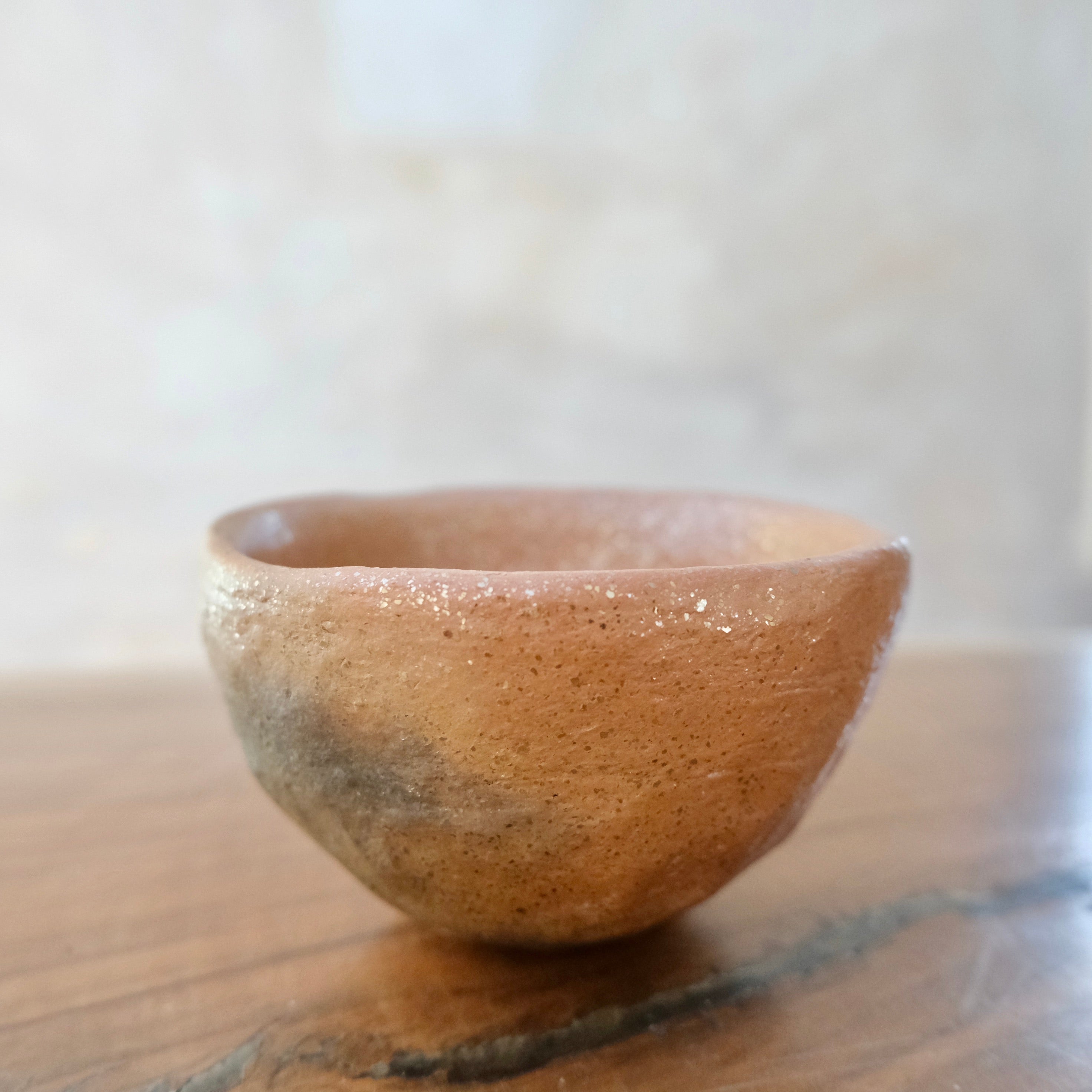 Micaceous clay earthenware tea bowl by The New New Age.