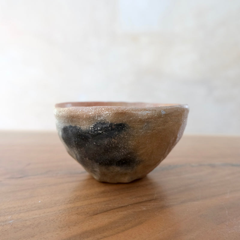 Pit fired micaceous clay earthenware tea bowl by The New New Age.