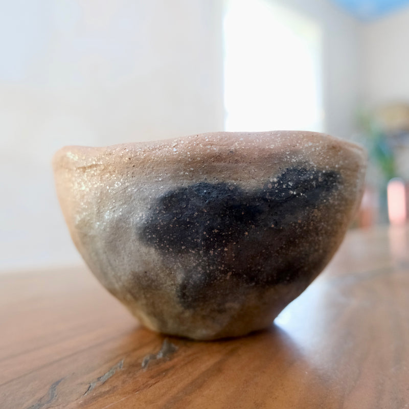 Pit fired micaceous clay earthenware tea bowl by The New New Age.