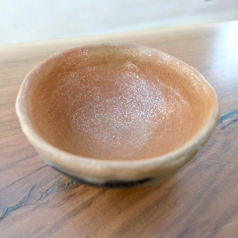 Pit fired micaceous clay earthenware tea bowl by The New New Age.