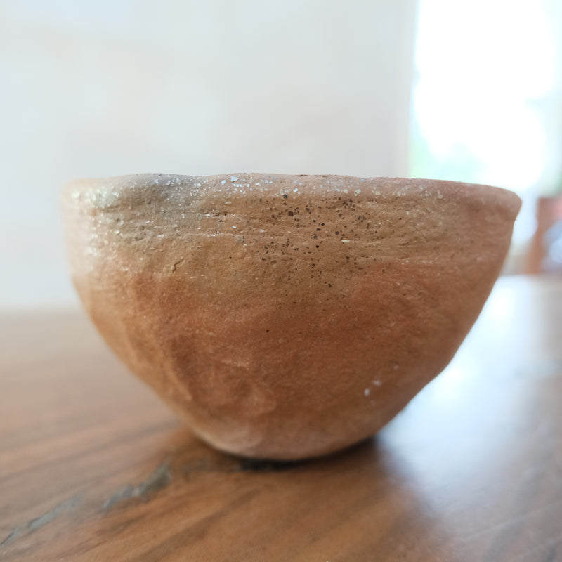 Pit fired micaceous clay earthenware tea bowl by The New New Age.