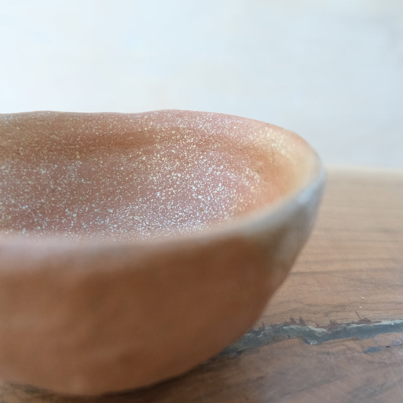 Pit fired micaceous clay earthenware tea bowl by The New New Age.