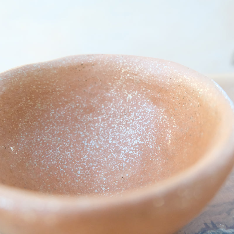 Micaceous clay earthenware tea bowl by The New New Age. 