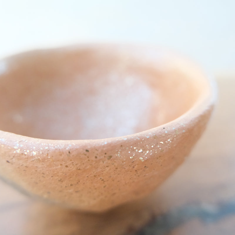 Micaceous clay earthenware tea bowl by The New New Age. 