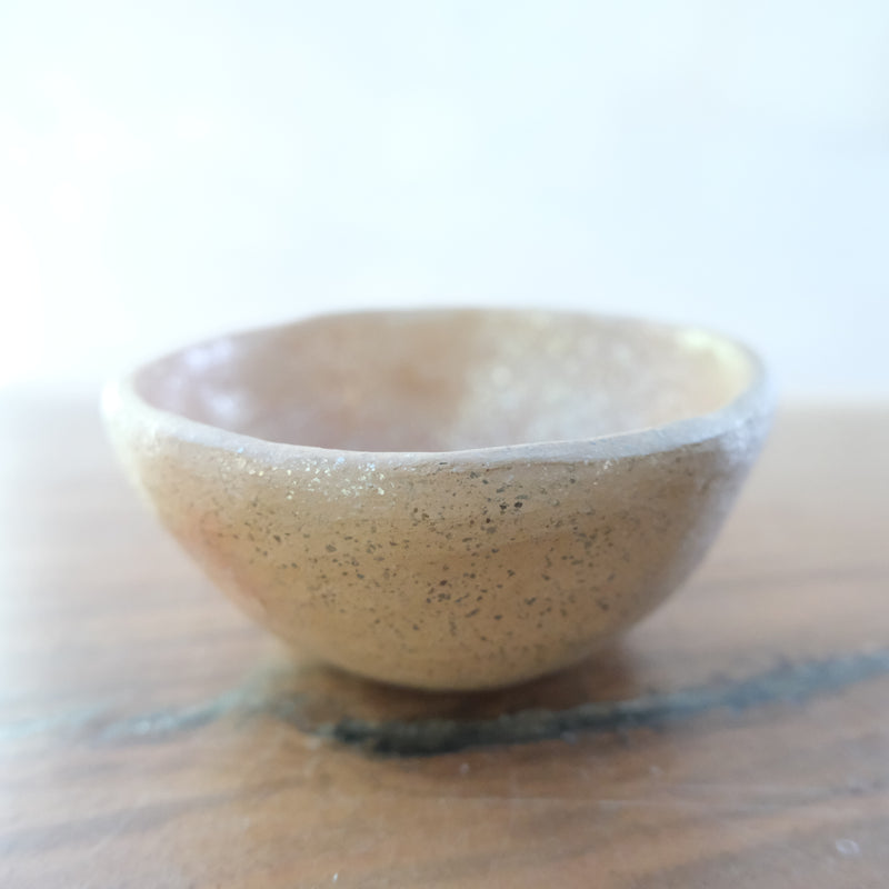 Micaceous clay earthenware tea bowl by The New New Age