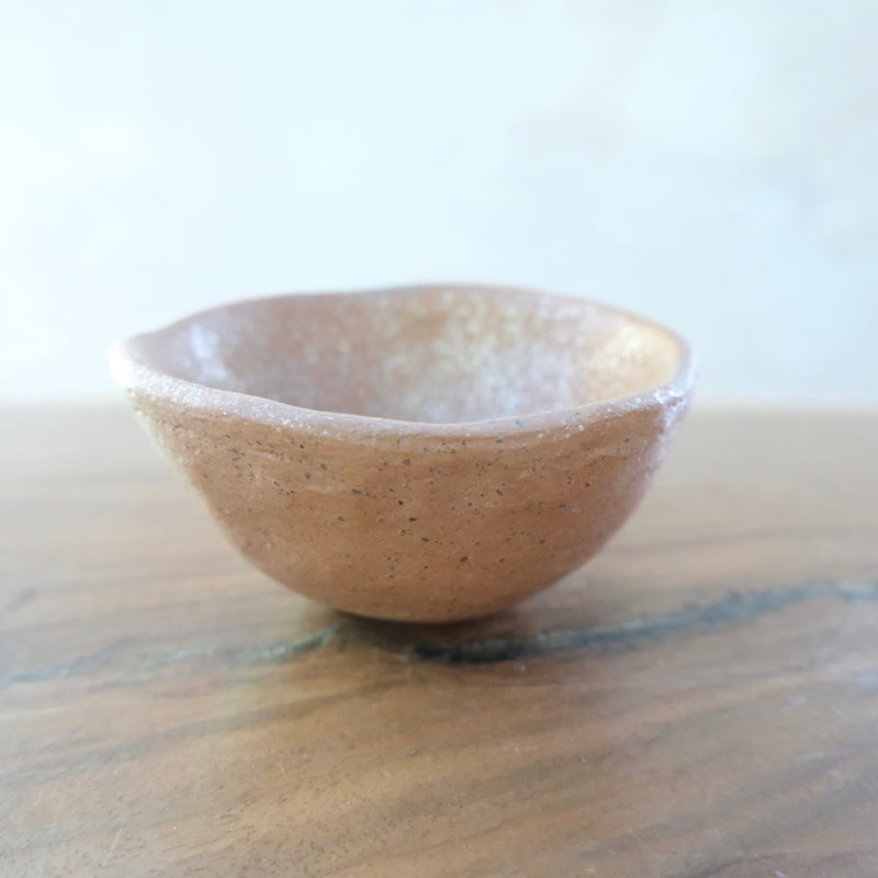 Micaceous clay earthenware tea bowl by The New New Age