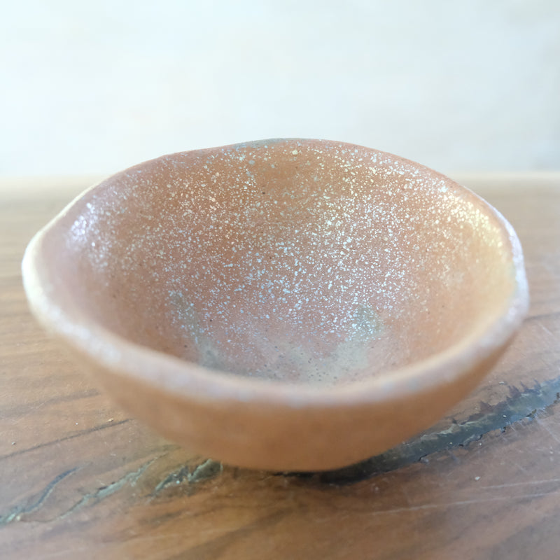 Micaceous clay earthenware tea bowl by The New New Age