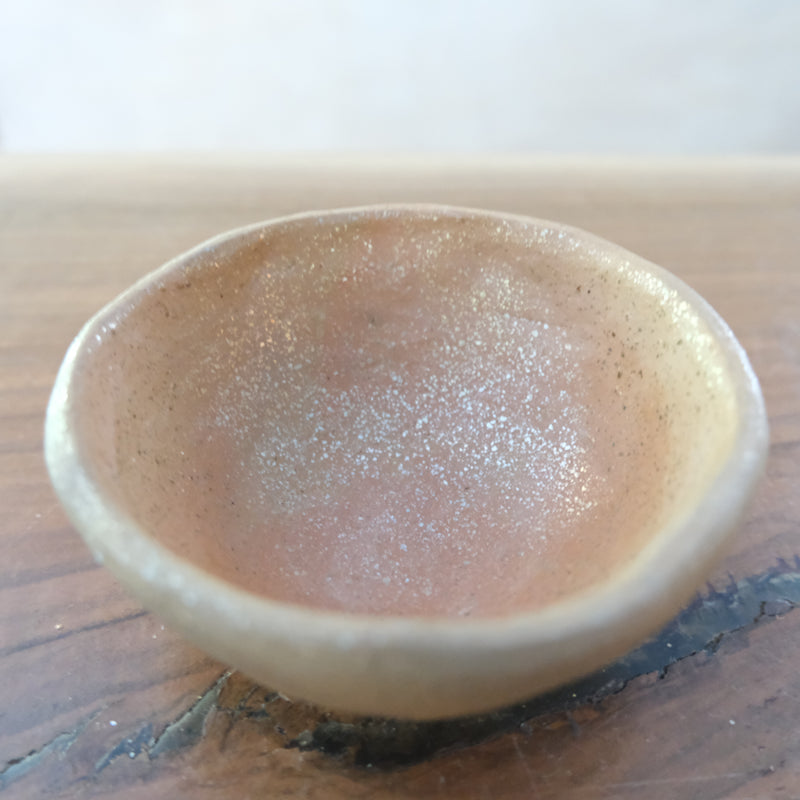 Micaceous clay earthenware tea bowl by The New New Age