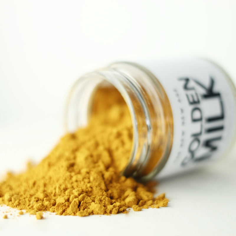 Close up of Golden Milk, an organic turmeric latte herbal powder blend made by The New New Age.