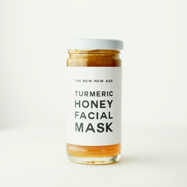 Jar of The New New Age Turmeric Honey Face Mask. Featuring raw honey and certified organic turmeric.