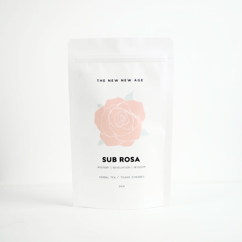 A bag of organic herbal tea, called Sub Rosa, featuring  rhodiola root, rose petals, holy basil, sage.  Formulated by The New New Age herb farm.