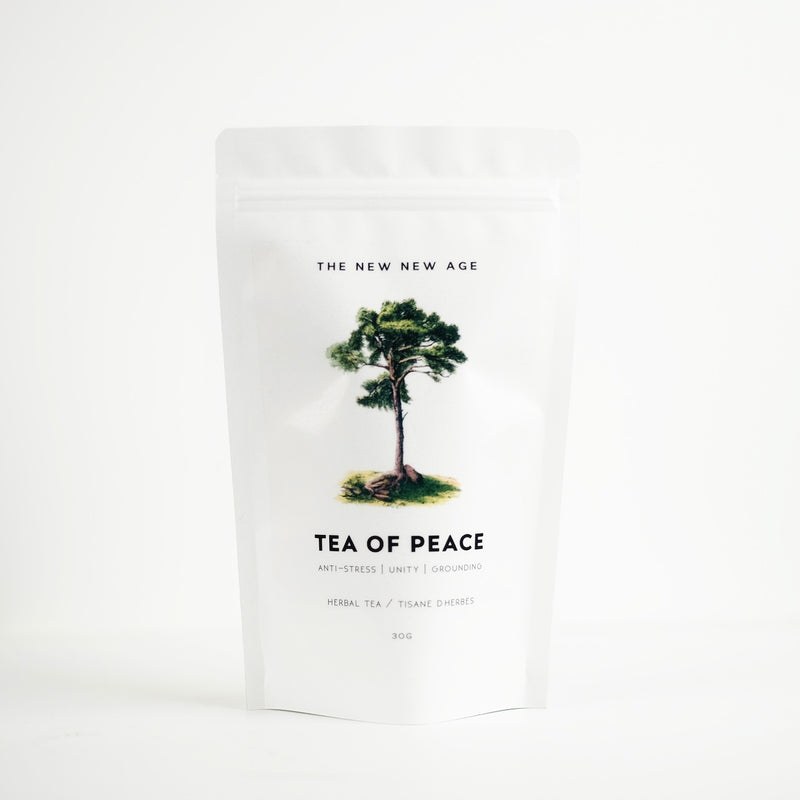 A bag of organic herbal tea called Tea of Peace, featuring eastern white pine, elder flower, yarrow and reishi mushroom.  Formulated by The New New Age. pine needle tea