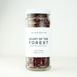 A jar of Rose & Reishi Mushroom tea, called Heart of The Forest, made by The New New Age.