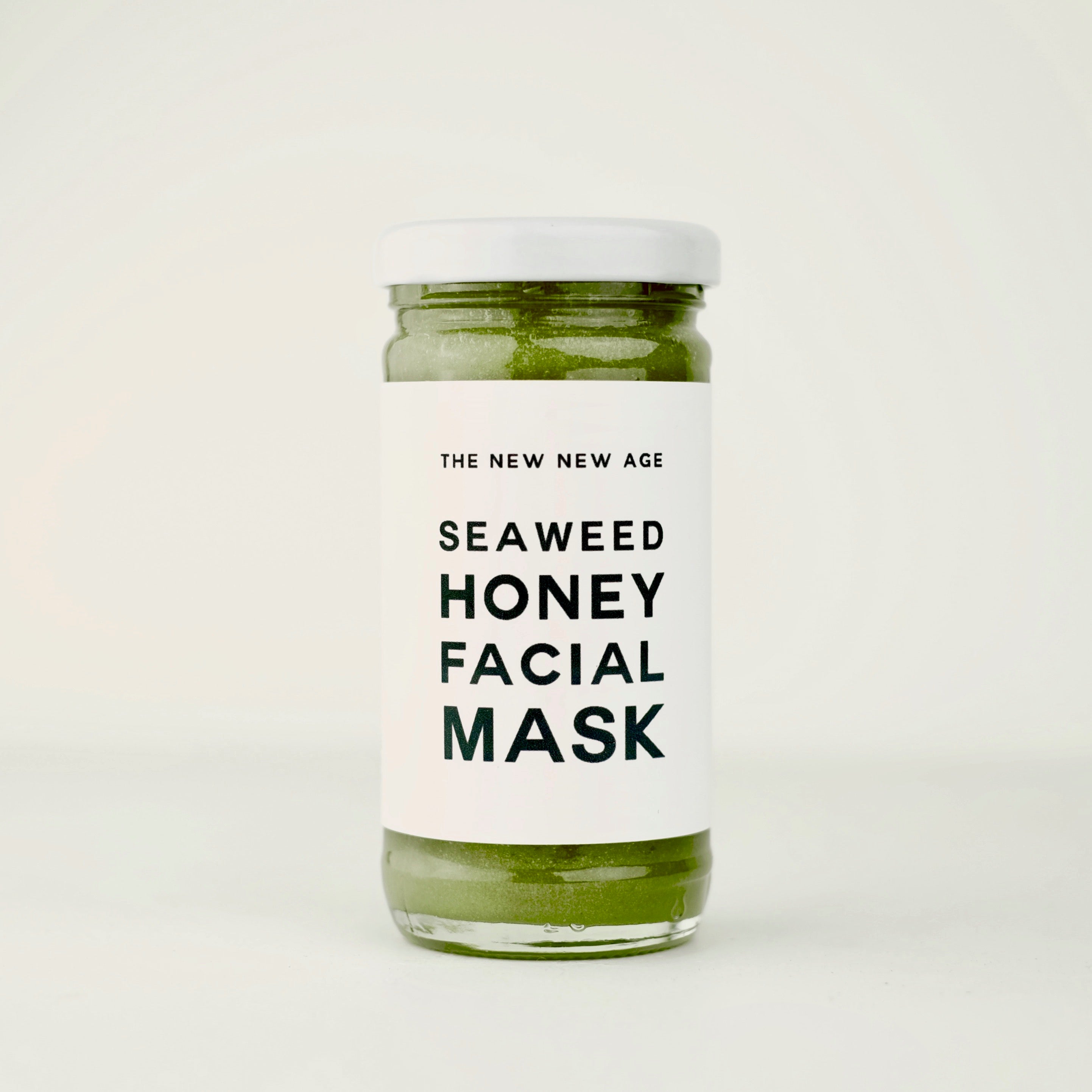 A jar of our Seaweed Honey Face Mask, featuring wildcrafted kelp from the North Atlantic ocean, certified organic spirulina and raw wildflower honey from Ontario, Canada.